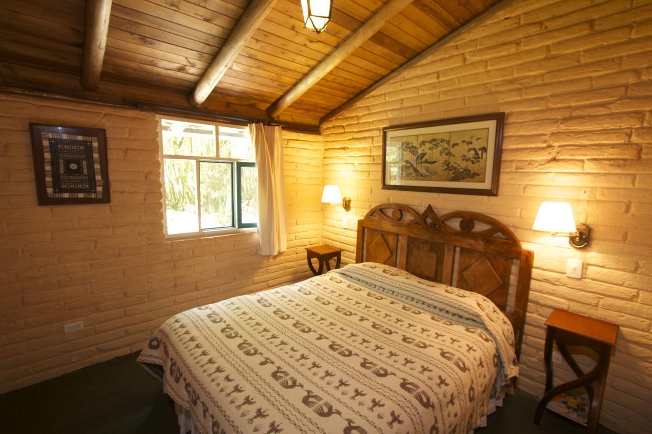 Las Palmeras Inn Отавало Номер фото